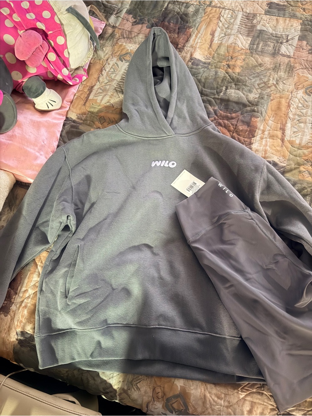 Wilo Women's Gray Pullover Hoodie with Subtle Logo and leggings